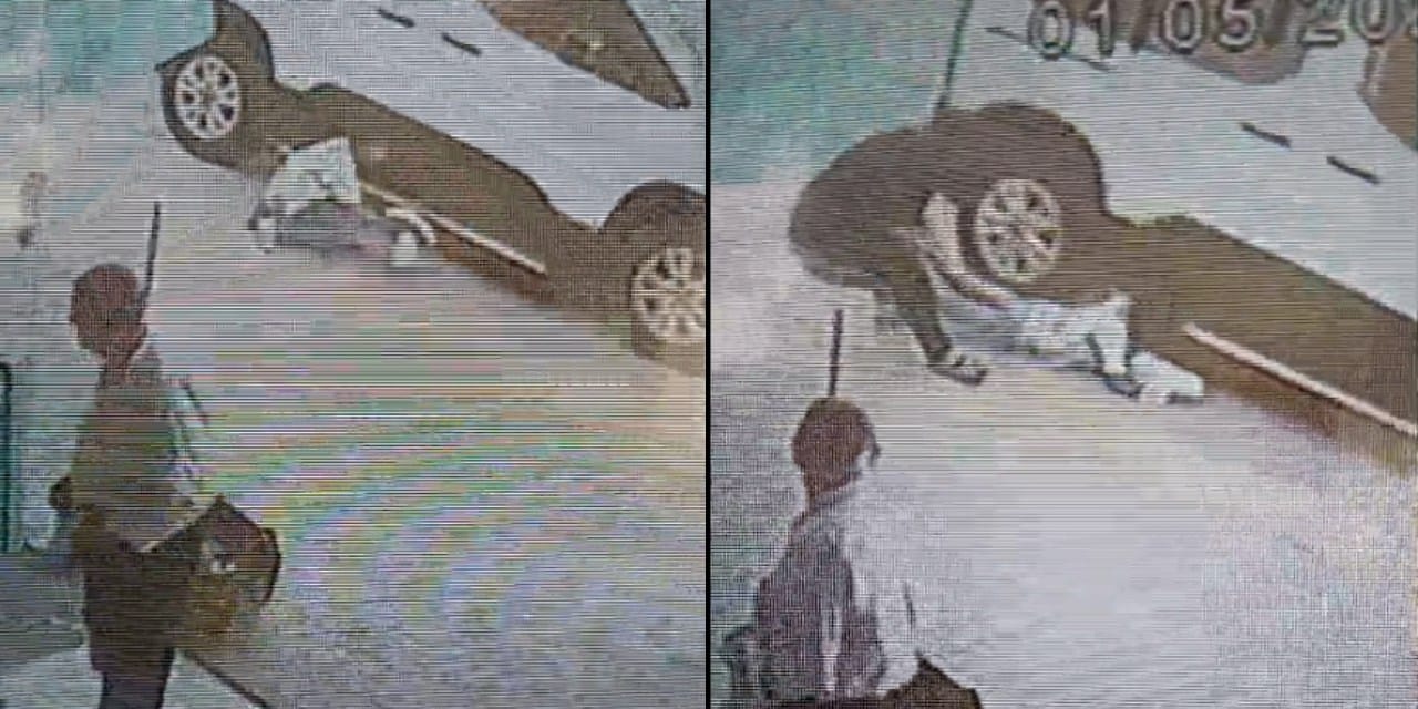 Topunu almak için aracın altına giren çocuk, büyük bir tehlikeden kıl payı kurtuldu
